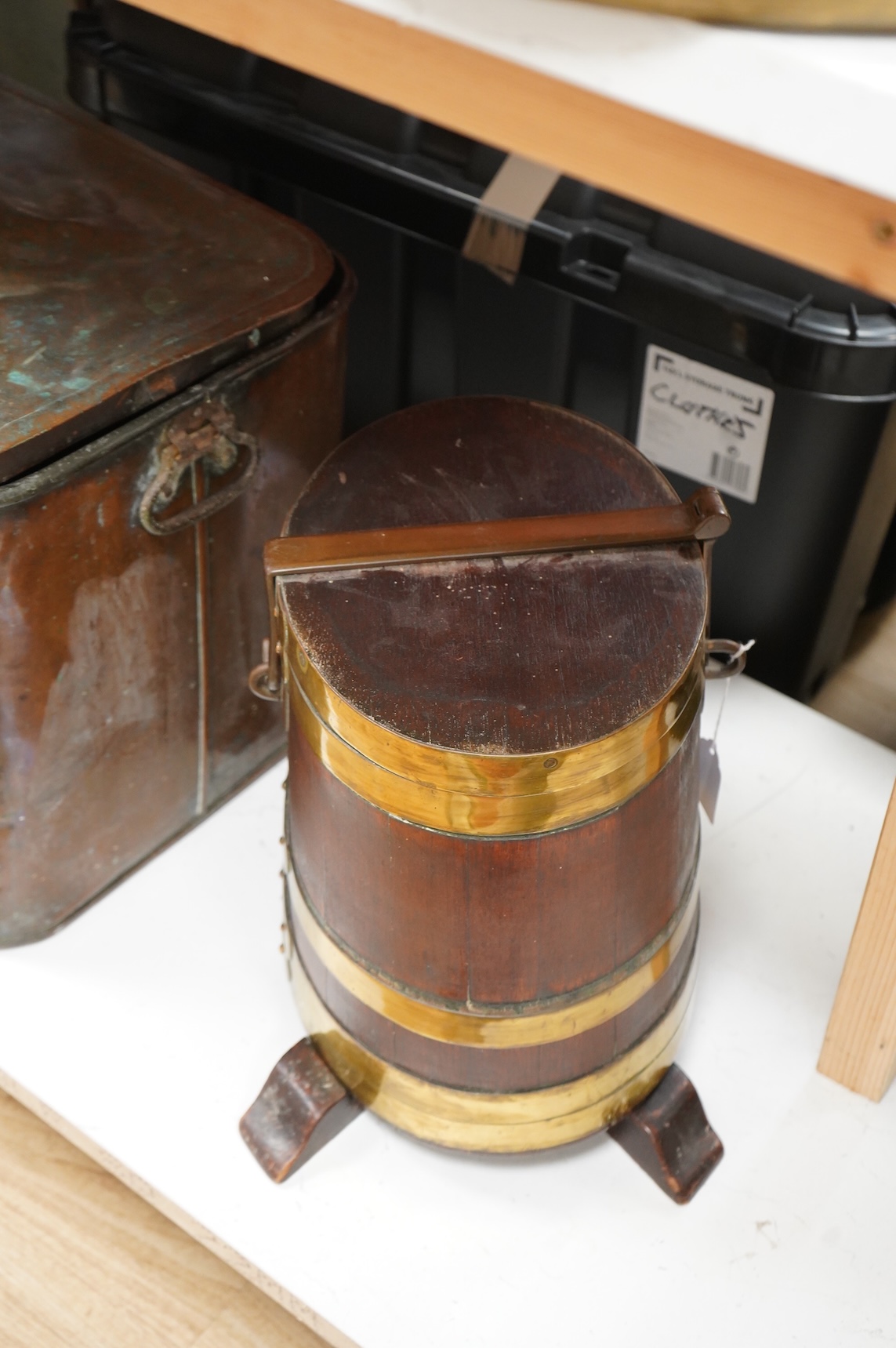 A 19th century teak and brass bound navy rum barrel on stand, 34cm high